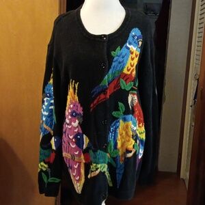 1X the Quacker Factory cardigan black w/ colorful parrots on it.